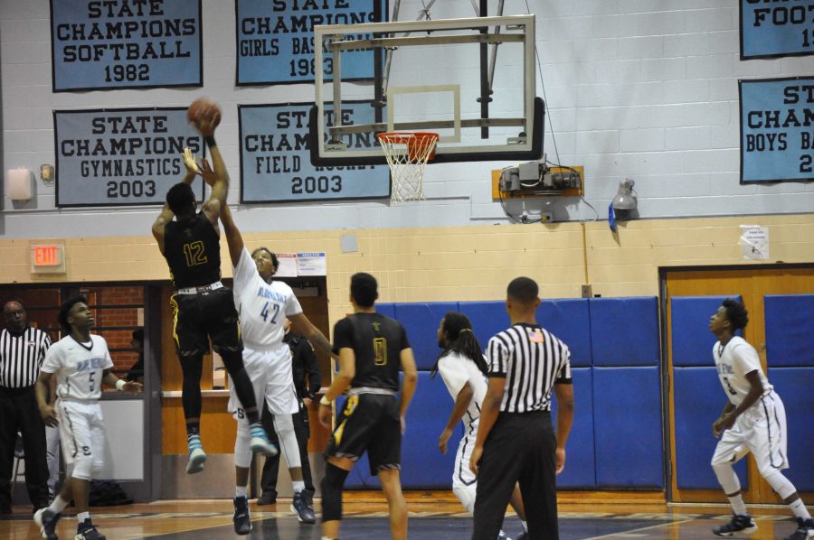 RM boys varsity basketball bounces back in victory over Springbrook