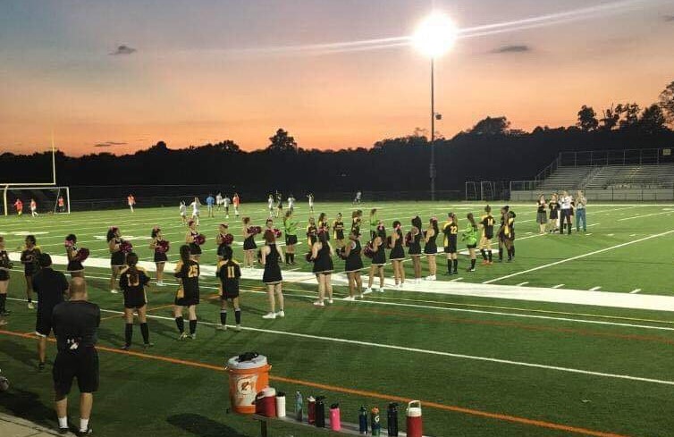 RM Poms cheer on the five seniors on the girls varsity soccer team.
Photo credits to Selma Hamza