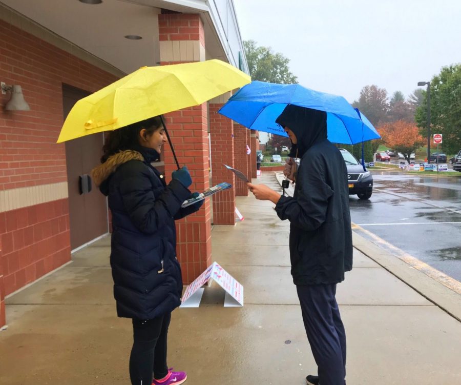 Sophomore Amna Shamim helps out on election day. 