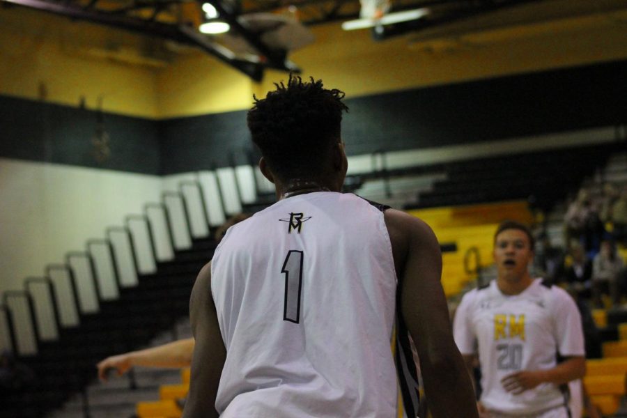 RM student suits up to play basketball on the home court