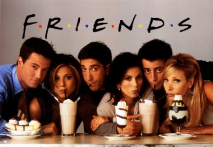 The friends pose in front of milkshakes for a Friends promotional poster.