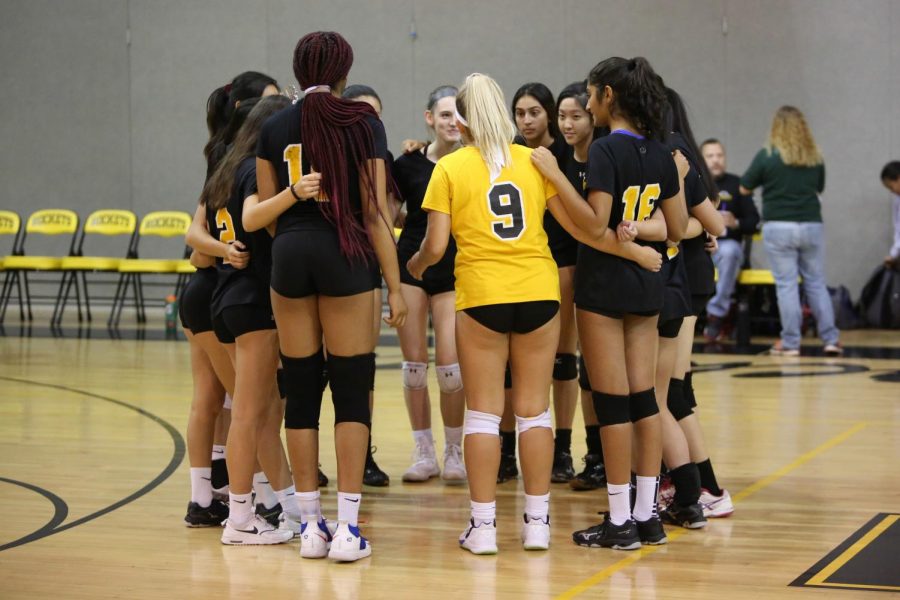 Girls+volleyball+huddles+up+during+their+Senior+Night+game+against+Gaithersburg.