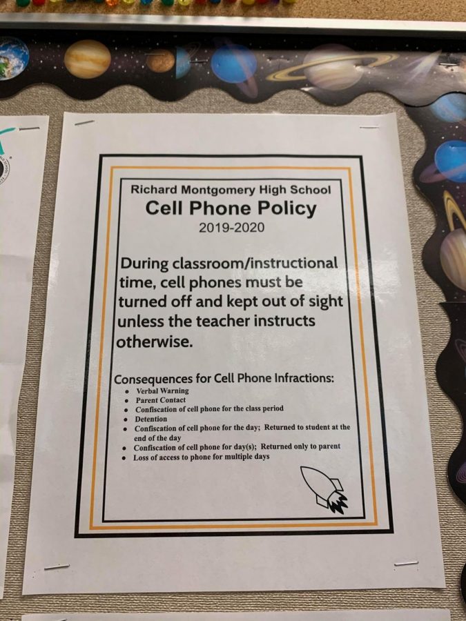 Poster in RM classrooms describing new cell phone policy.