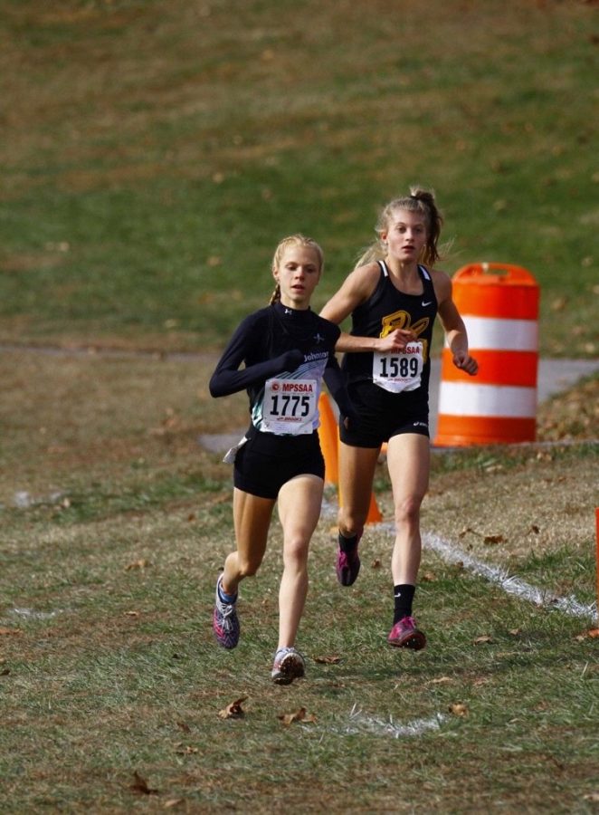 Charlotte Turesson (right) was selected onto the All Decade XC team for MCPS in just her junior year. 