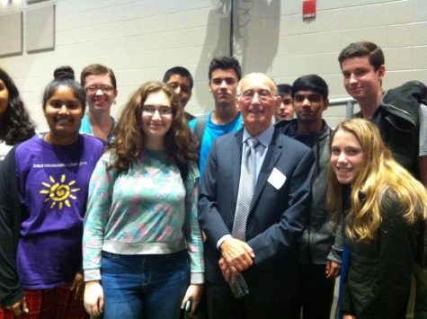 Students pose with Marty Weiss after his presentation on the Holocaust. 