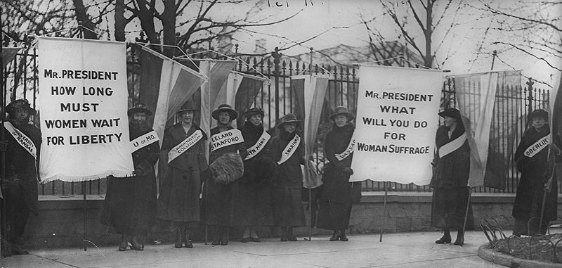 Women suffragists protesting in front of the White House in 1917.