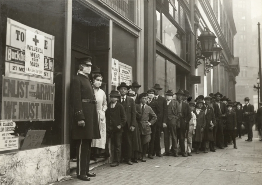 People wait in line for flu masks in San Francisco in 1918. 
