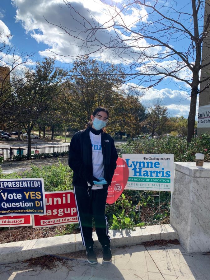 Victoria Koretsky stands outside of the Executive Office Building in Downtown Rockville during an early voting volunteer shift.