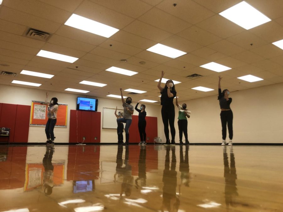 Members of the RM Dance Club rehearse an energetic routine in preparation for their performance in International Night. Pictured students include, but are not limited to; seniors Sarah Luan, Valerie Murillo, and Monica Escalante; and freshman Manuela Martins Figueiredo. “I’m both happy and sad to be performing in my last International Night with RMDC,” said Senior Sarah Luan. International Night will be held in early December.