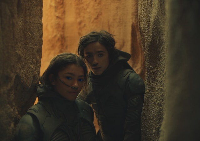 Timothee Chalamet and Zendaya as Paul and Chani in DUNE.