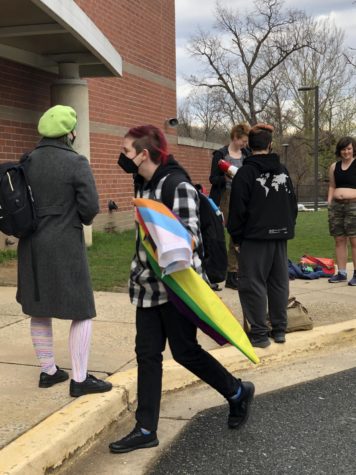 RMs SAGA club organizes a student-led walkout in opposition of Floridas recently passed Dont Say Gay Bill during periods 2 & 3. Students carried brightly colored pride flags on their backs and shouted chants, lead by Senior Eleanor Clemans-Cope on a megaphone. Mrs. Sara Hasheem-Liles attended the walkout and reflects on her own personal experiences. It just makes me kind of emotional, because I remember doing this exact same thing in high school too, said Mrs. Hasheem-Liles.