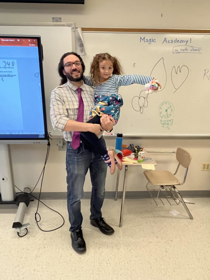 When students walked into math teacher Mr. Wainwrights classroom today, they were greeted by his adorable, six-year-old daughter Piper. Piper enthusiastically claimed, NO math allowed, and enrolled her audience in Magic Academy. Her effervescent and precious persona provided a much needed break to the Calculus students. 