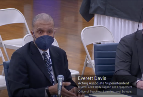 Acting Associate Superintendent of Student and Family Support and Engagement Everett Davis speaks at a Board of Education work session in regards to proposed amendments  surrounding student well-being.