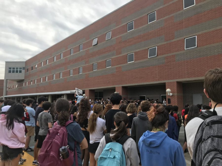 The walkout saw a high turnout, with over 100 students making their way to the bus loop for the protest. Although the walkout was organized by juniors, students from all grades attended.