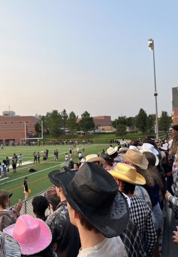 RM students wear cowboy hats while watching a home football game against Seneca Valley High School on Sept. 16.