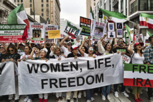 Women on the streets of Iran, protesting for human rights. (Photo courtesy of Associated Press, licensed through Creative Commons)