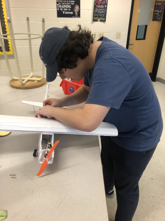 Sophomore Jame Krinsky works on a model airplane for Aviation Club. Aviation Club was established this school year by sophomore Kmran Danish. In the club, students stay after school to build model airplanes to fly. When asked why he founded Aviation Club Danish responded, “I created aviation club to foster my passion for aerospace.”