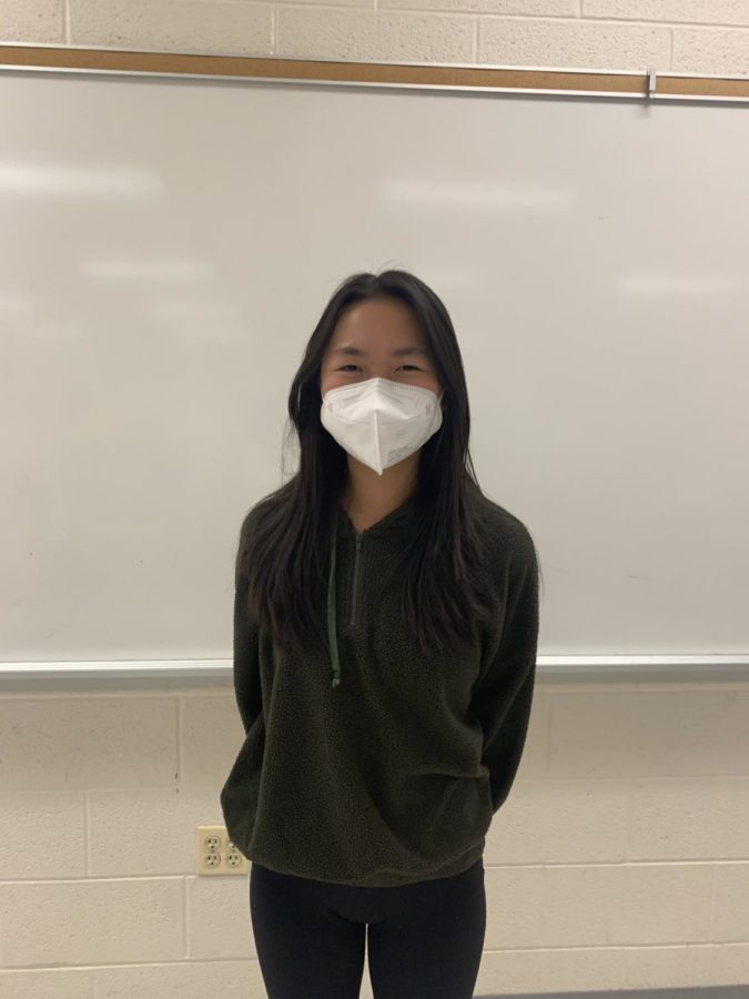 Freshman Sherry Lin rocks an athleisure-inspired outfit consisting of a hoodie and leggings.
