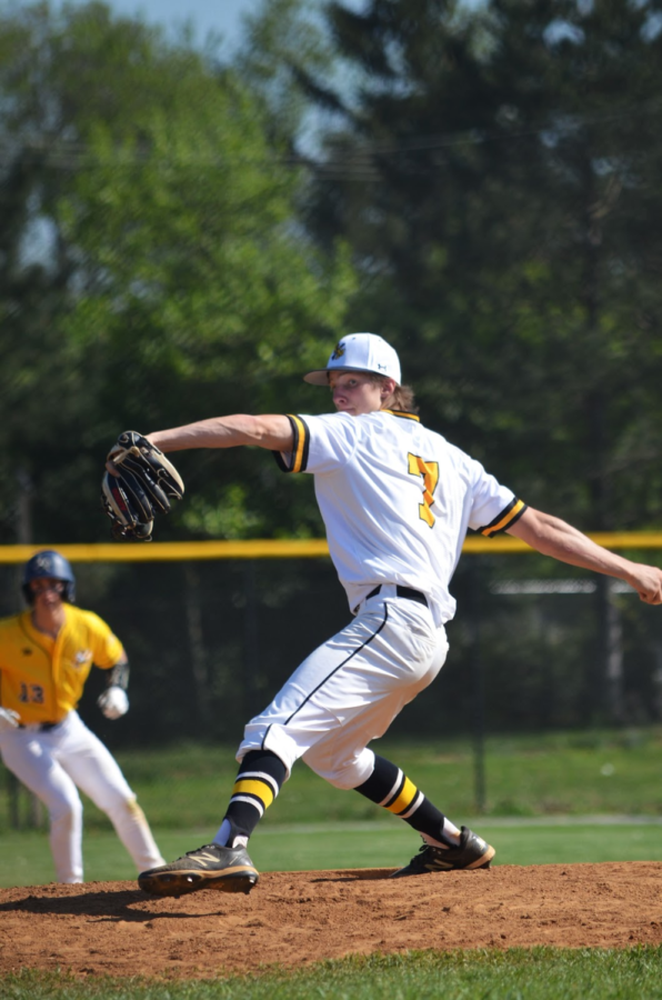 Senior Noah Rosier winds up for a pitch against B-CC.