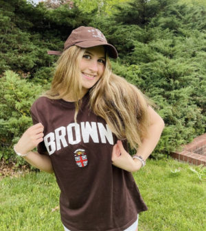Junior Livia Vendetti poses for a photo repping her Brown University merchandise.