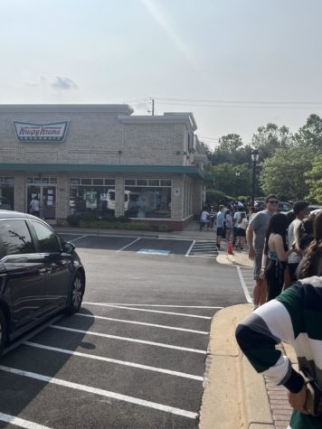 Photo of the Day: Seniors line up for free donuts