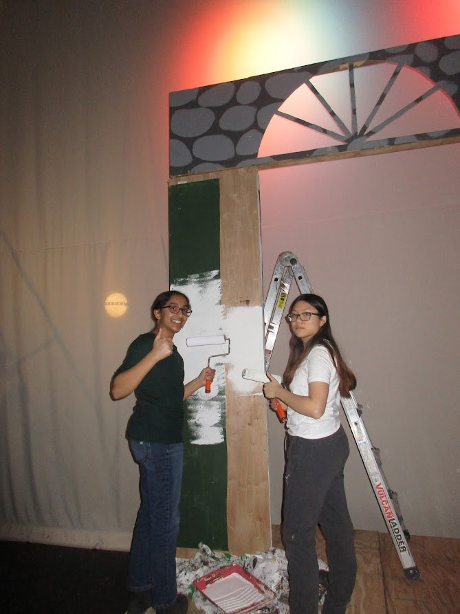 Seniors Nitya Donthi and Grace Young work on set decoration for the upcoming Hello Dolly show. 