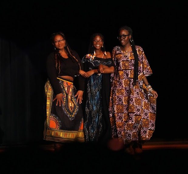 Students participating in the fashion show present their cultural clothing at African Diaspora Night on Feb. 21. 