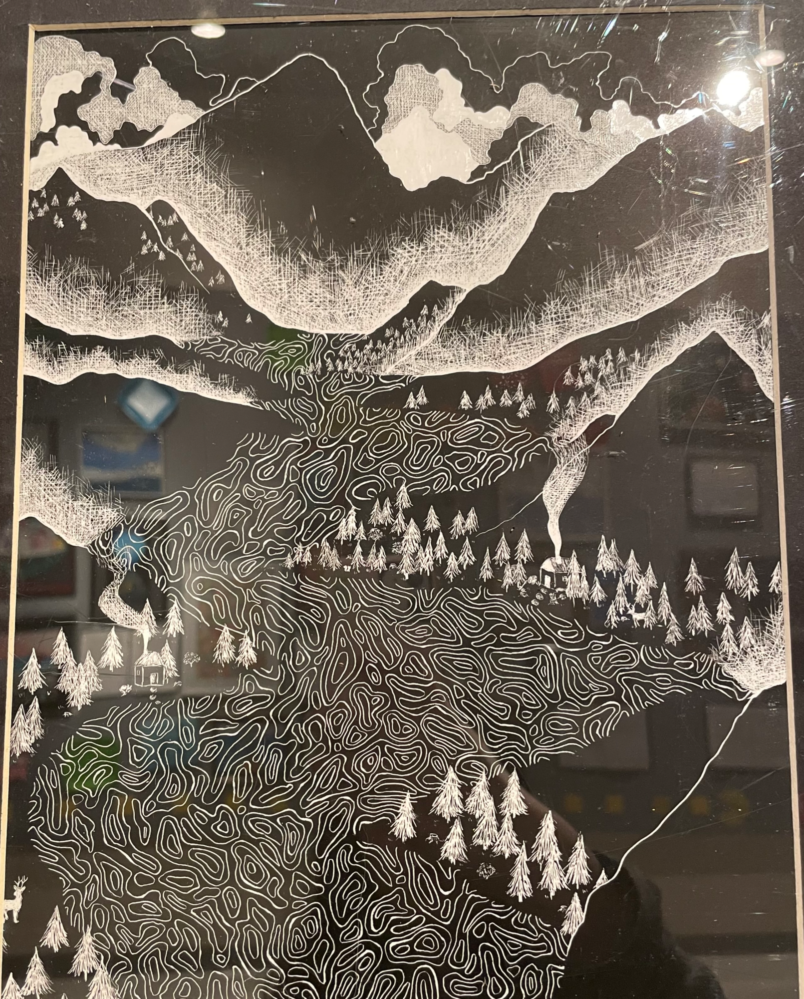 Senior Josie Chong depicts a mountainous scene with a flowing river in River Valley. 