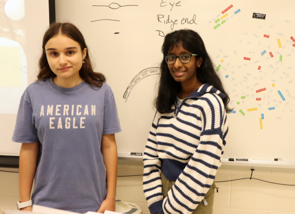 Sophomores Nadia Blackman, fundraising director, and Rithika Arun Venkatesh, president of MedLife, recruit members at the club’s interest meeting.