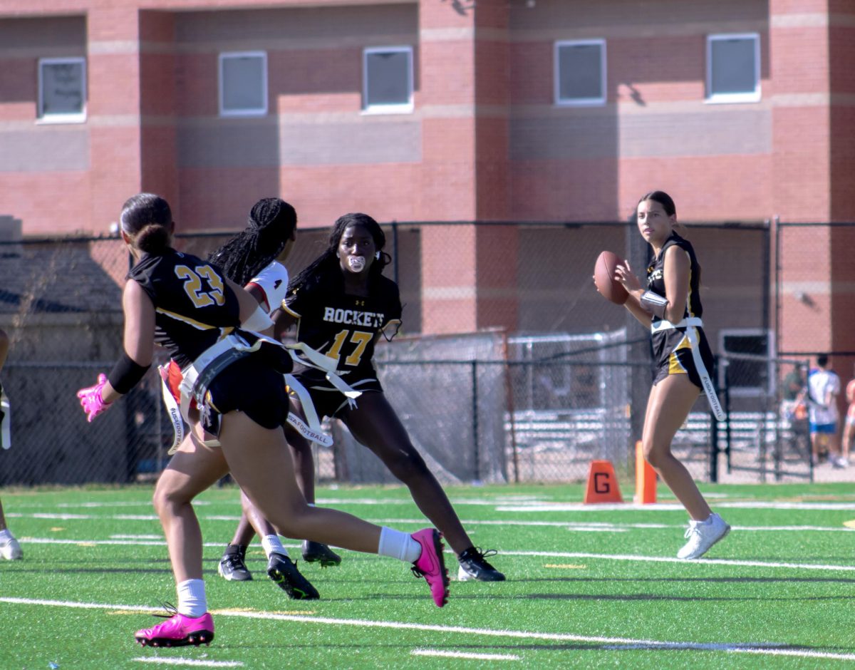 Quarterback Emerson Koenig looks to throw the ball to an open receiver. 