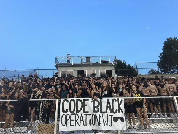 The RM student section embraces school spirit at the first football game of the year versus Walter Johnson High School. (Photo courtesy of Coach Tanya Lee)