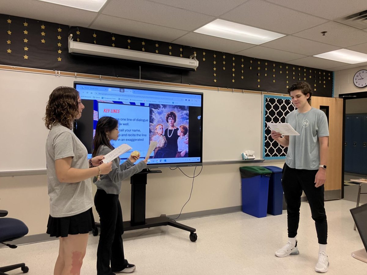 Students in IB Language and Literature work on acting out their scenes from the Greek play, Medea. Seniors Joseph Simak, Logan Tannenbaum, and Elani Bui are beginning to memorize their lines and improve their stage presence. For the past week, they have been hard at work to add their own flourish to their scene, such as incorporating echoes to emphasize certain dialogue. "I enjoy that this class provides an opportunity to learn in different ways," Bui said.
