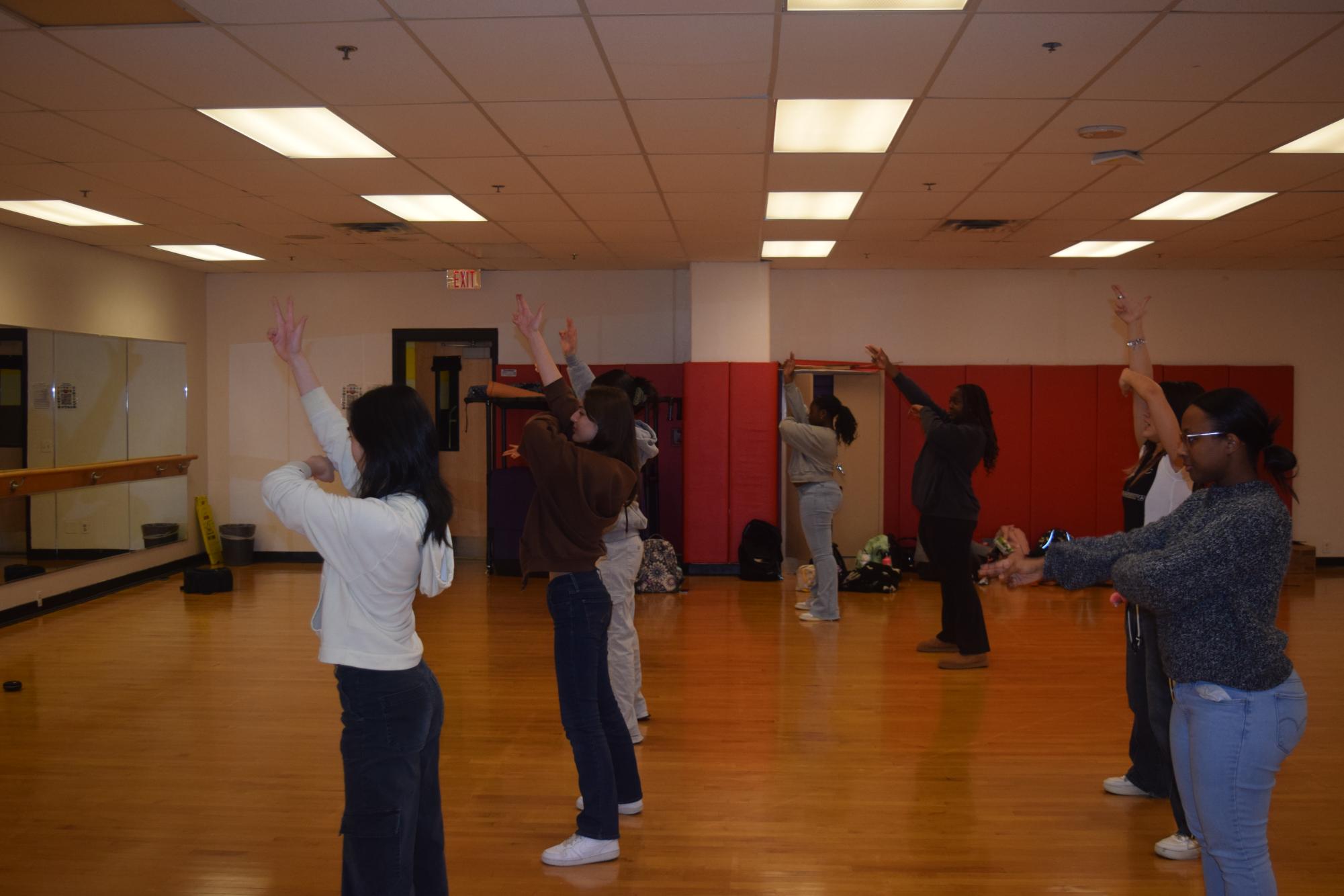 K-Pop Dance Club members learn the routine for "Pink Venom" by Blackpink.