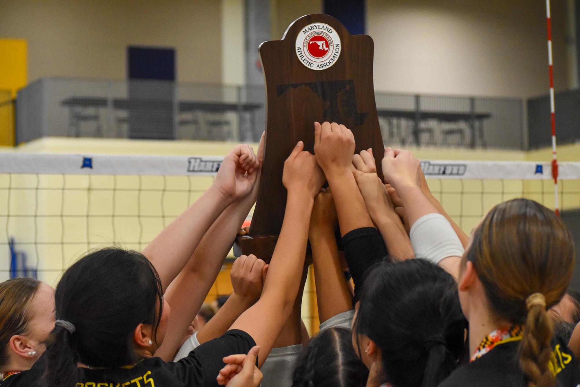 The Rockets hoist the 4A State Championship together after their 3-0 win over Broadneck HS.