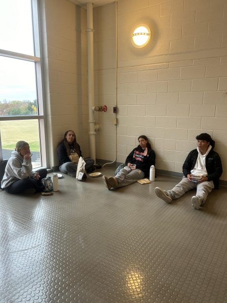 Juniors Brooke Smith, Gabrielle Stephenson, Emerson Koenig and Felipe Zegarra sit in one of RM's many stairwells during lunch.