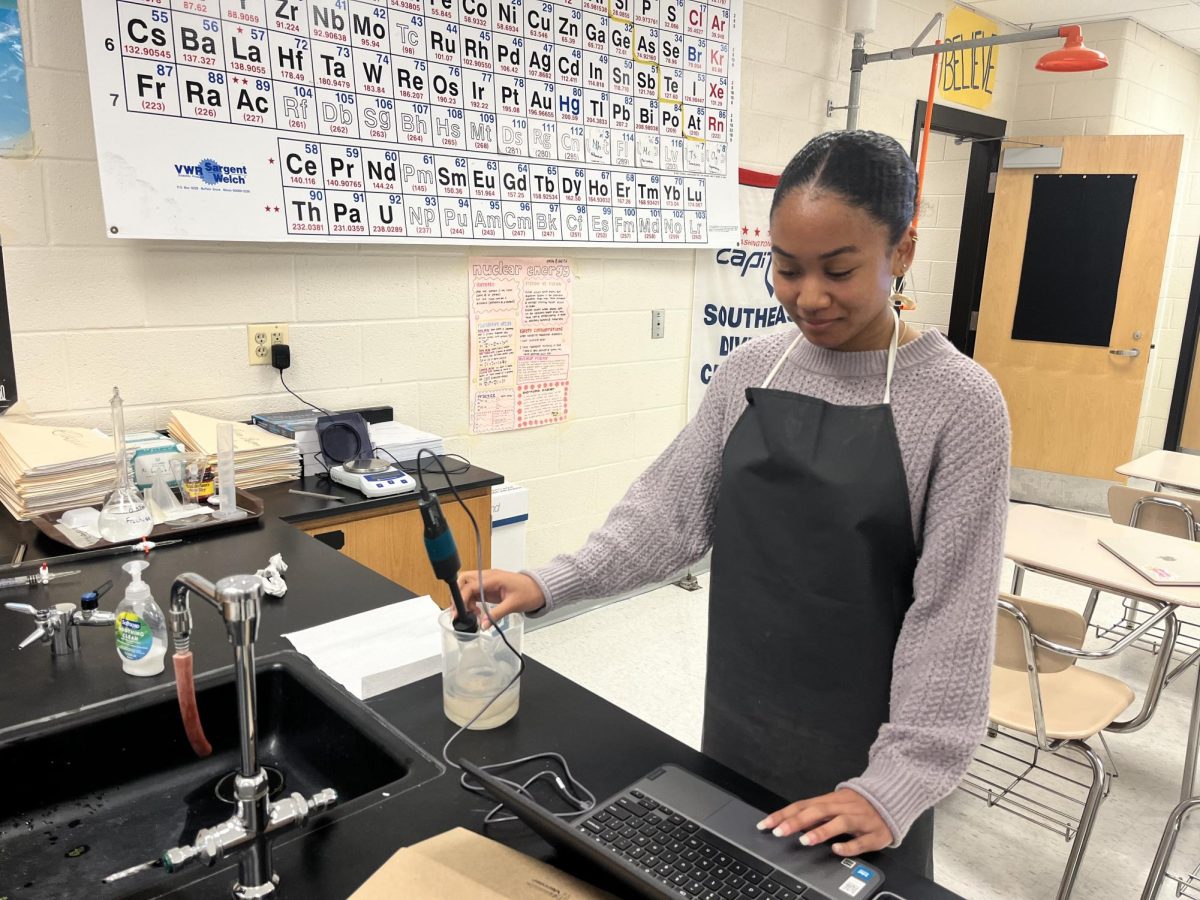 Senior Mara Porter works on her chemistry lab during fifth period. IB seniors have to perform an unique lab as part of the IB diploma program. "I have really enjoyed my IA so far," Porter said. "It's a great learning experience.
