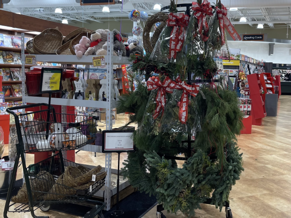 Christmas trees line the floor of a Harris Teeter grocery store in Clarksburg.