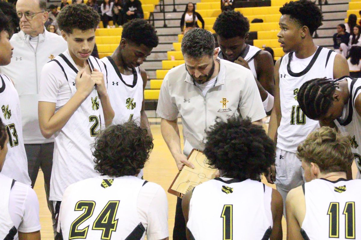 Coach David Breslaw draws up a play during a varsity boys basketball game vs BCC. 