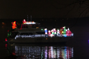 A decorated boat floats along the Washington Channel for the Wharf in D.C.'s annual holiday boat parade. (Photo courtesy of Geetanjali Raju)