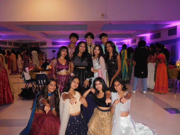 Club Natya members pose after their dance at the Clarksuburg Naach Ball.