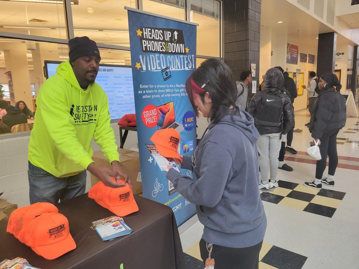 Photo of the Day : Students gain awareness through merch