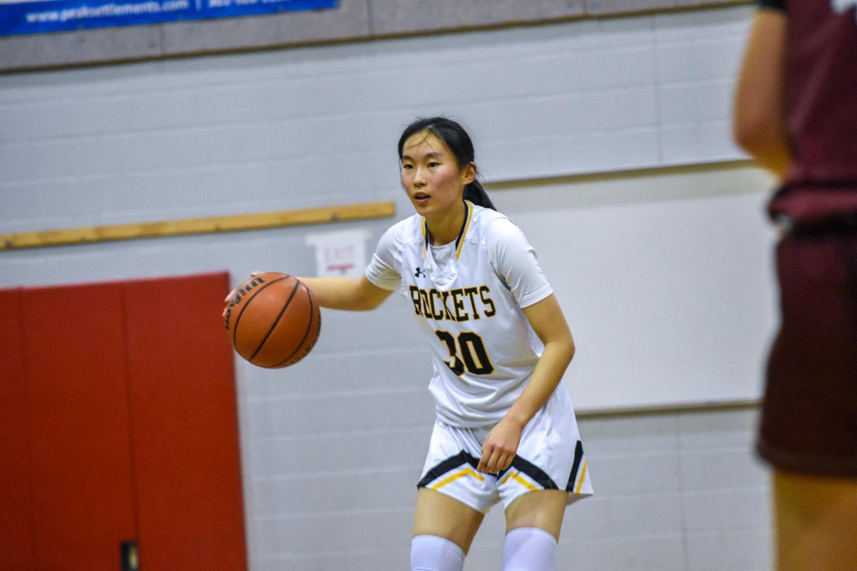 Diao prepares to drive to the basket against a Panther defender. Diao recently committed to Yale University for basketball.