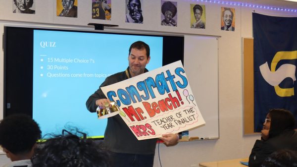 Social studies teacher Pete Beach celebrates with his class and the SGA students after being named Teacher of the Year finalist.