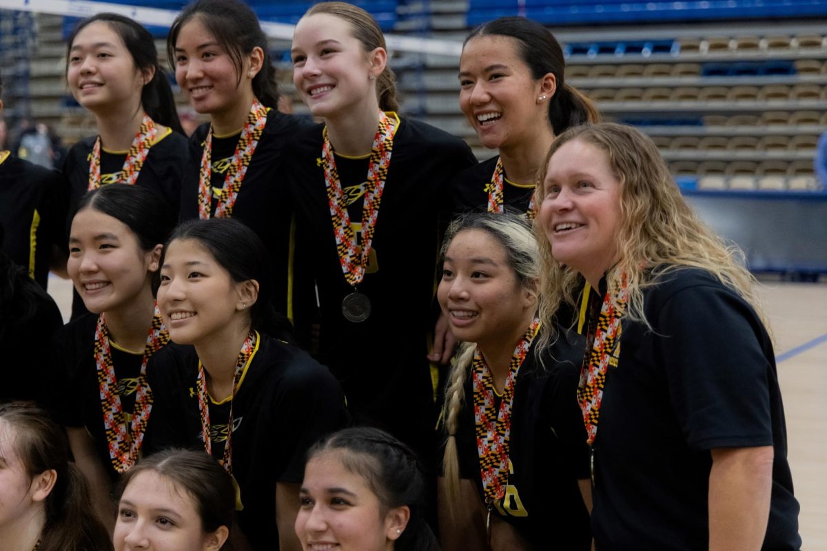 Coach of the year; Barber-Strunk leads to repeat