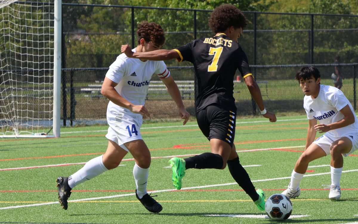 Class of ‘25 alum Matthew Kuwik loads up and prepares to shoots a deep goal against Churchill. 