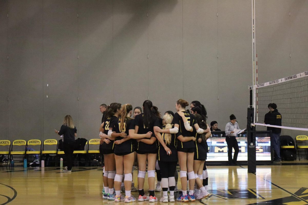 The team huddles up to refocus during a match.