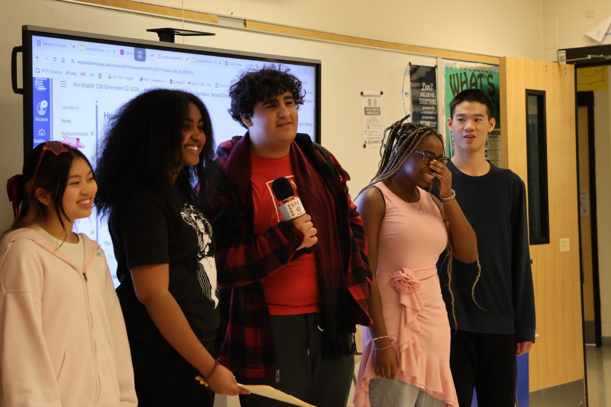 Singing proud, RM music students went around to different classrooms and sang songs to certain students who had others pay for it. 