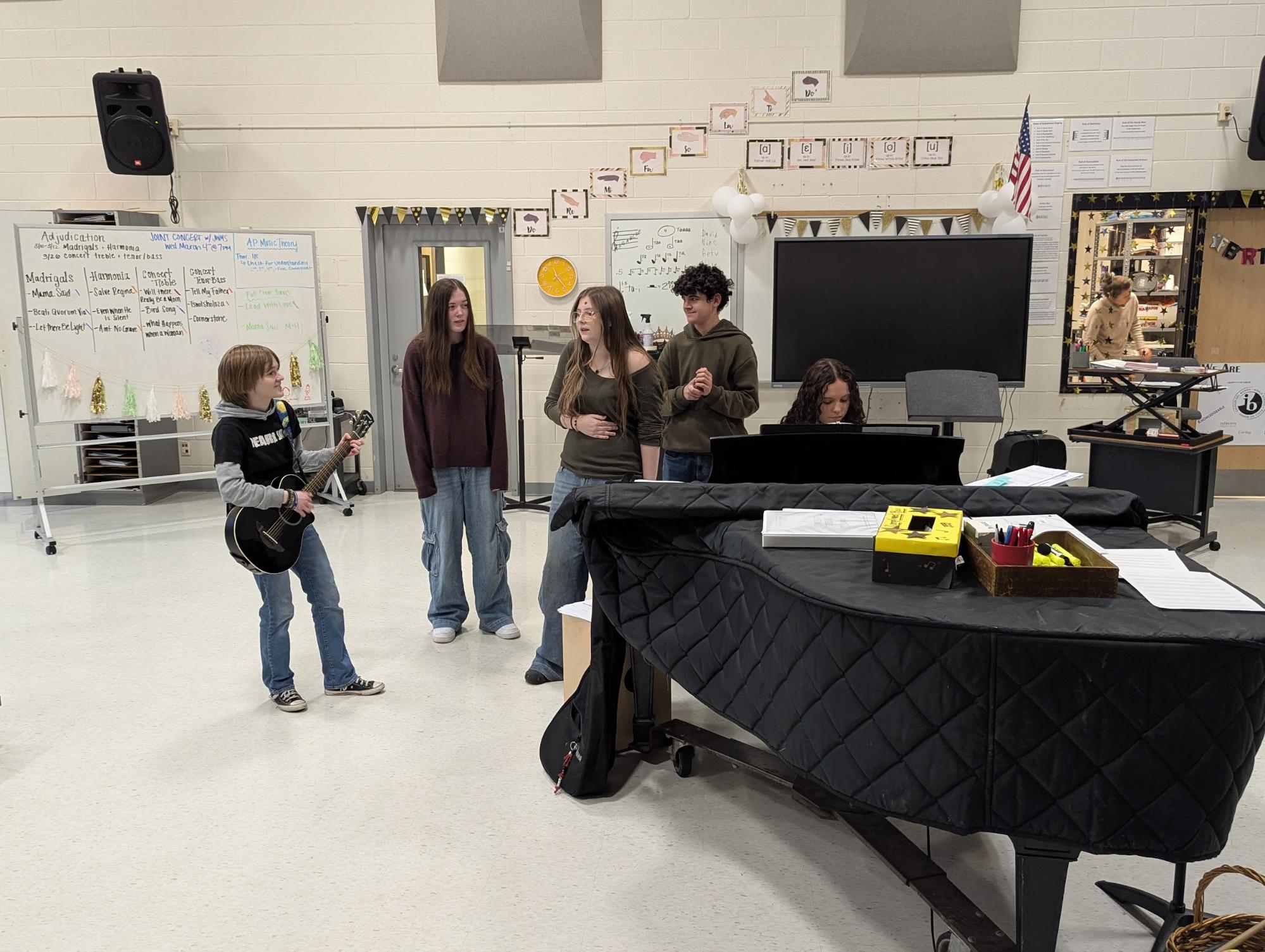 The members of Cherry Lane practice with their instruments in the chorus room—also where Tri-M holds their monthly performance meetings.