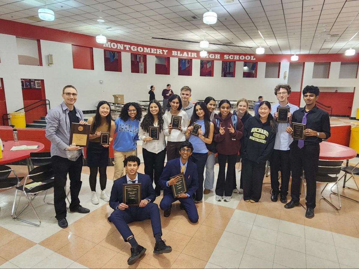 The RM debate team poses for a group picture after winning playoffs. (Photo courtesy of Ganesh Ramamurthi)