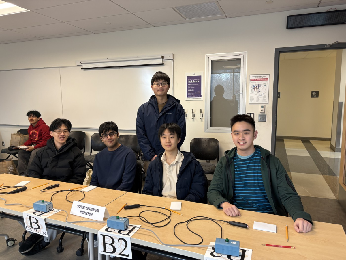 Seniors David He, Keshav Ramaswamy, junior Ethan Pei, senior Andrew Zhao and junior Sedric Su—the five members of the 2025-2026 Science Bowl team—pose for a photo after finishing a round in a tournament. (Photo courtesy of Sedric Su)
